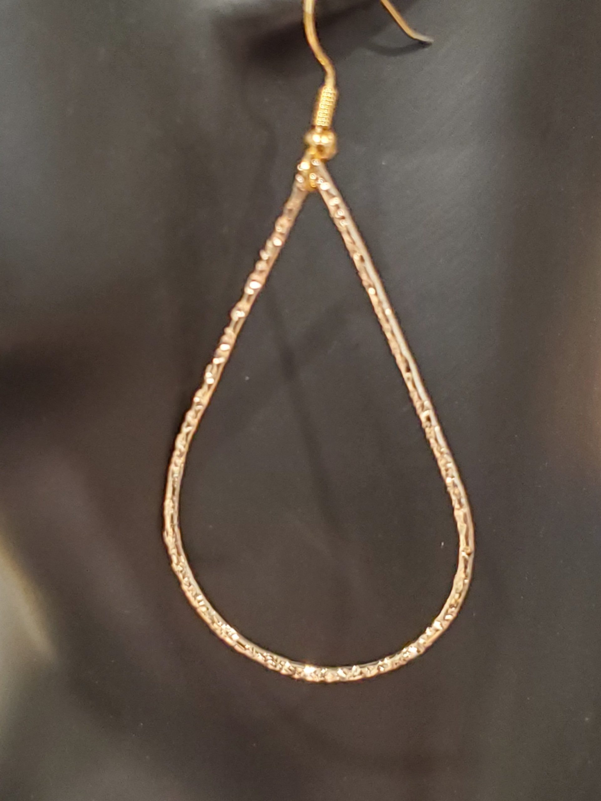 Long Textured Teardrop Gold Filled French Wire Earrings shown on mannequin