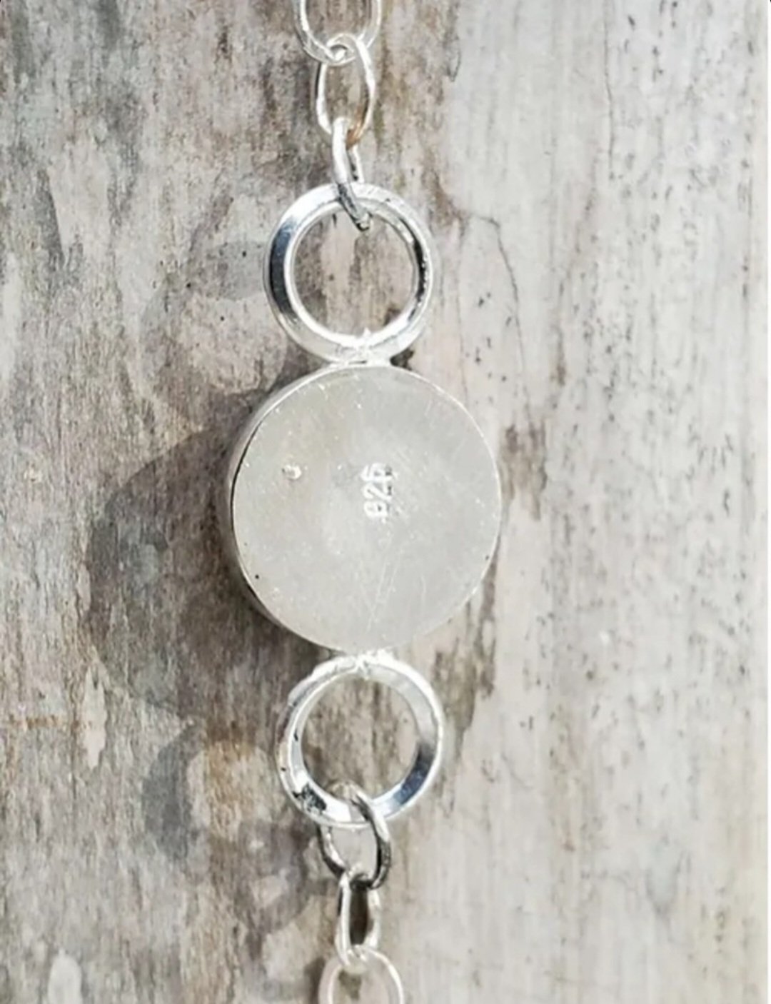 Round Turquoise Cabochon Sterling Silver Chain Bracelet shown from the back of the setting with .925 stamped on back