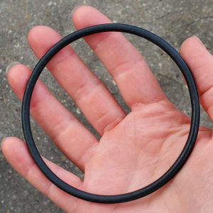 Ceramic Coated Hoop Bangle Bracelet in Black held by model