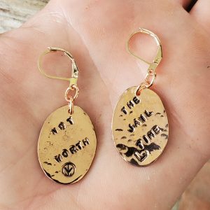 Not Worth The Jail Time Copper Oval Earrings with a hammered polished texture